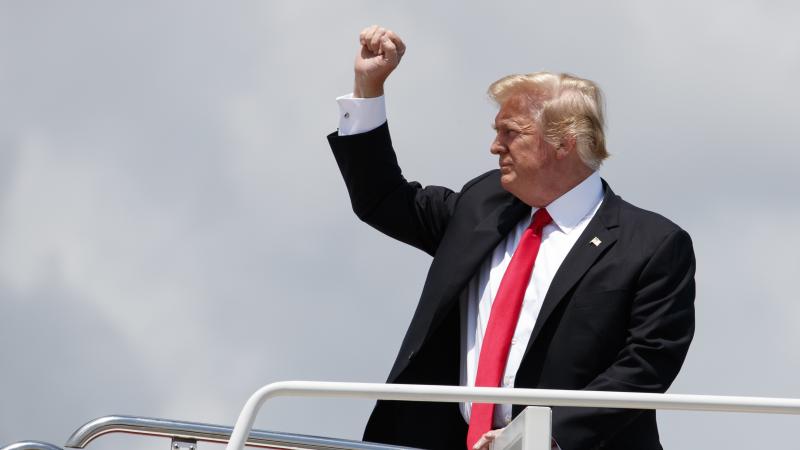 President Trump boards Air Force One, Thursday, en route to Montana. President Trump boards Air Force One, Thursday, en route to Montana.