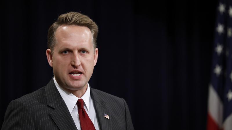 Former acting Assistant Attorney General for Civil Rights John Gore speaks at the Justice Department in 2018 in Washington, D.C. Gore and other Trump administration officials are accused of providing false or misleading statements about the origins of a c Former acting Assistant Attorney General for Civil Rights John Gore speaks at the Justice Department in 2018 in Washington, D.C. Gore and other Trump administration officials are accused of providing false or misleading statements about the origins of a c