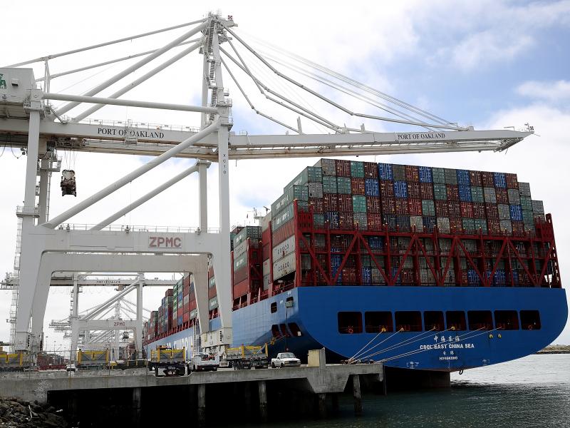 A container ship sits in a berth at the Port of Oakland in California last year. President Trump announced additional tariffs on imports from China on Thursday. A container ship sits in a berth at the Port of Oakland in California last year. President Trump announced additional tariffs on imports from China on Thursday.