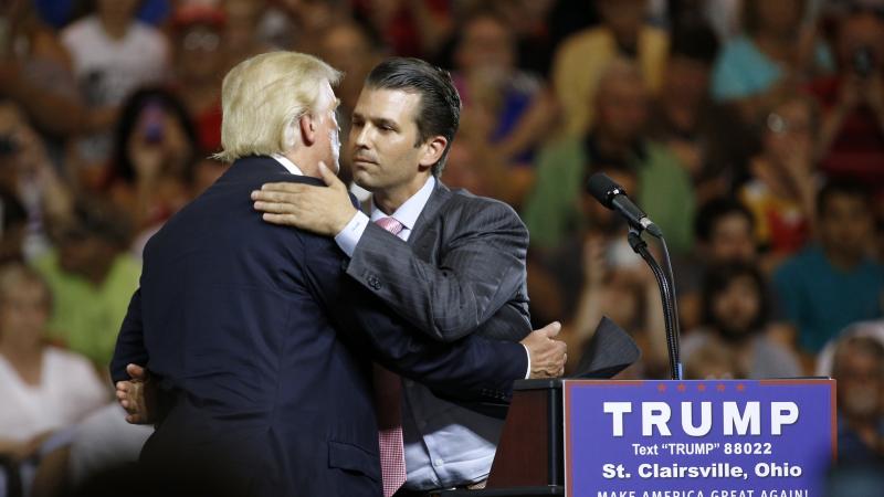 Donald Trump Jr. hugs his father, Donald Trump, during a campaign rally in Ohio, weeks after Trump Jr. met with a Russian lawyer, as he sought dirt against Democrat Hillary Clinton. Donald Trump Jr. hugs his father, Donald Trump, during a campaign rally in Ohio, weeks after Trump Jr. met with a Russian lawyer, as he sought dirt against Democrat Hillary Clinton.