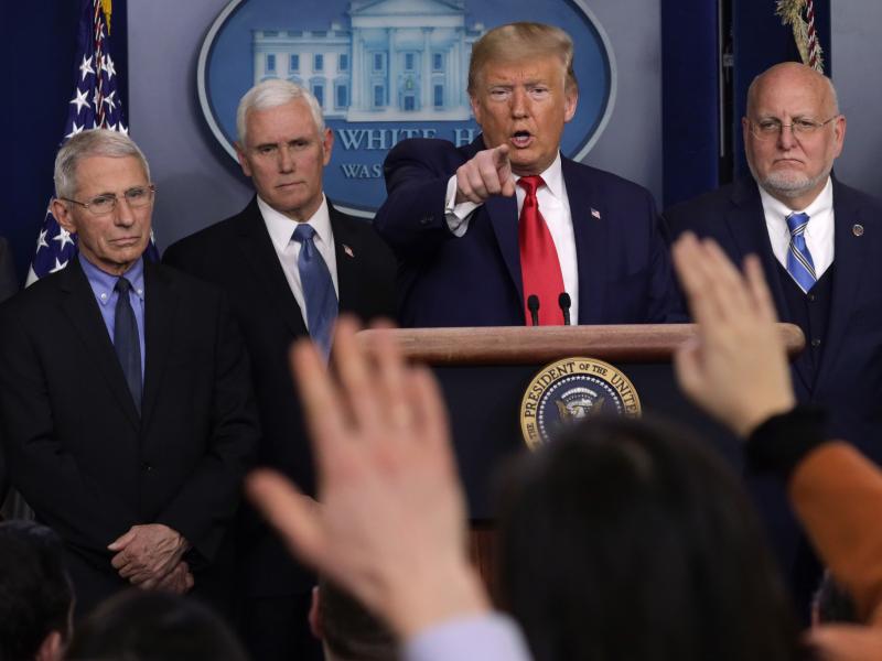 President Trump takes questions at a press conference with, from left, National Institute for Allergy and Infectious Diseases Director Anthony Fauci, Vice President Mike Pence and Centers for Disease Control and Prevention Director Robert Redfield. President Trump takes questions at a press conference with, from left, National Institute for Allergy and Infectious Diseases Director Anthony Fauci, Vice President Mike Pence and Centers for Disease Control and Prevention Director Robert Redfield.