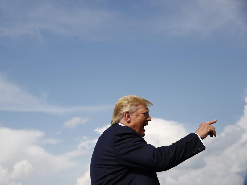 President Trump speaks with reporters before boarding Air Force One at Morristown Municipal Airport in Morristown, N.J., on Sunday. Among the topics was Trump's interest in buying Greenland from Denmark. President Trump speaks with reporters before boarding Air Force One at Morristown Municipal Airport in Morristown, N.J., on Sunday. Among the topics was Trump's interest in buying Greenland from Denmark.