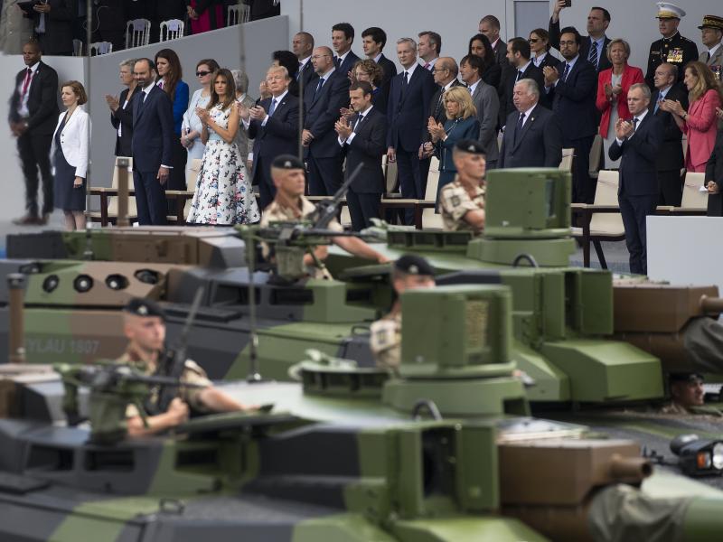 Tanks parade past President Trump, first lady Melania Trump, French President Emmanuel Macron and his wife, Brigitte Macron, during a Bastille Day parade on the Champs Elysees avenue in Paris on July 14, 2017. Tanks parade past President Trump, first lady Melania Trump, French President Emmanuel Macron and his wife, Brigitte Macron, during a Bastille Day parade on the Champs Elysees avenue in Paris on July 14, 2017.