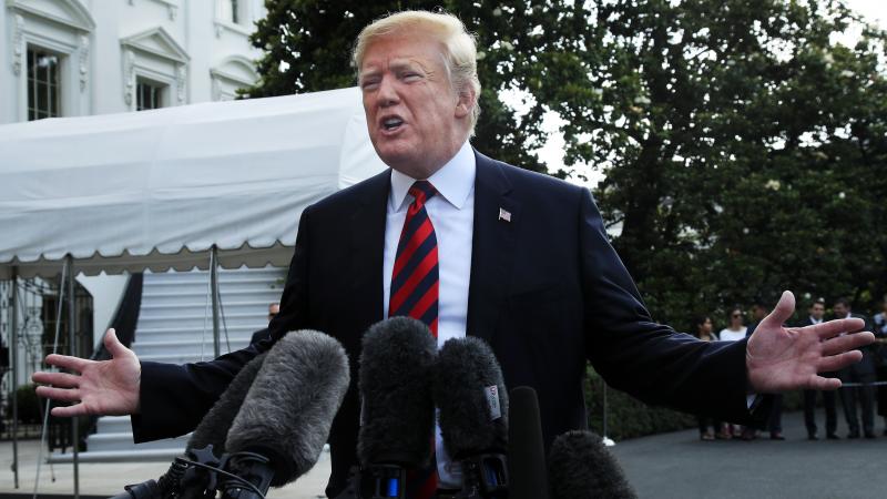 President Trump speaks to reporters before leaving the White House on Friday to attend the G-7 Summit in Charlevoix, Quebec. President Trump speaks to reporters before leaving the White House on Friday to attend the G-7 Summit in Charlevoix, Quebec.