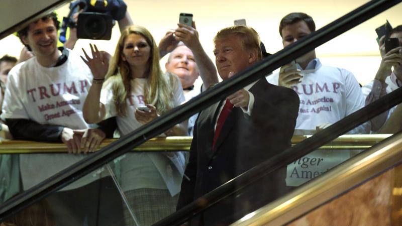 Republican presidential candidate and TV personality Donald Trump arrives by escalator to the tune of "Rockin' in the Free World." Musician Neil Young did not approve of his song choice. Republican presidential candidate and TV personality Donald Trump arrives by escalator to the tune of "Rockin' in the Free World." Musician Neil Young did not approve of his song choice.