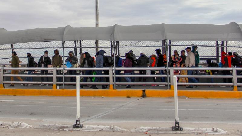 Migrants line up at the Paso del Norte International Bridge in Ciudad Juarez, Mexico, waiting to cross the border and request asylum in January. Thousands of asylum-seekers are waiting in Mexican border cities like Juarez right now, hoping for their turn Migrants line up at the Paso del Norte International Bridge in Ciudad Juarez, Mexico, waiting to cross the border and request asylum in January. Thousands of asylum-seekers are waiting in Mexican border cities like Juarez right now, hoping for their turn