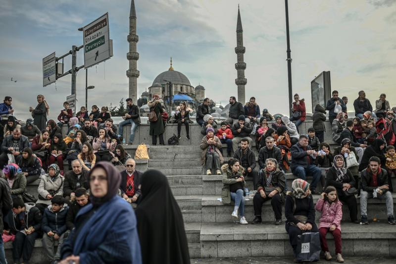 People enjoy an afternoon at Eminonu Square in Istanbul in January. A recent survey of personal beliefs and lifestyles in majority-Muslim Turkey has found a smaller portion of people describing themselves as religious. People enjoy an afternoon at Eminonu Square in Istanbul in January. A recent survey of personal beliefs and lifestyles in majority-Muslim Turkey has found a smaller portion of people describing themselves as religious.