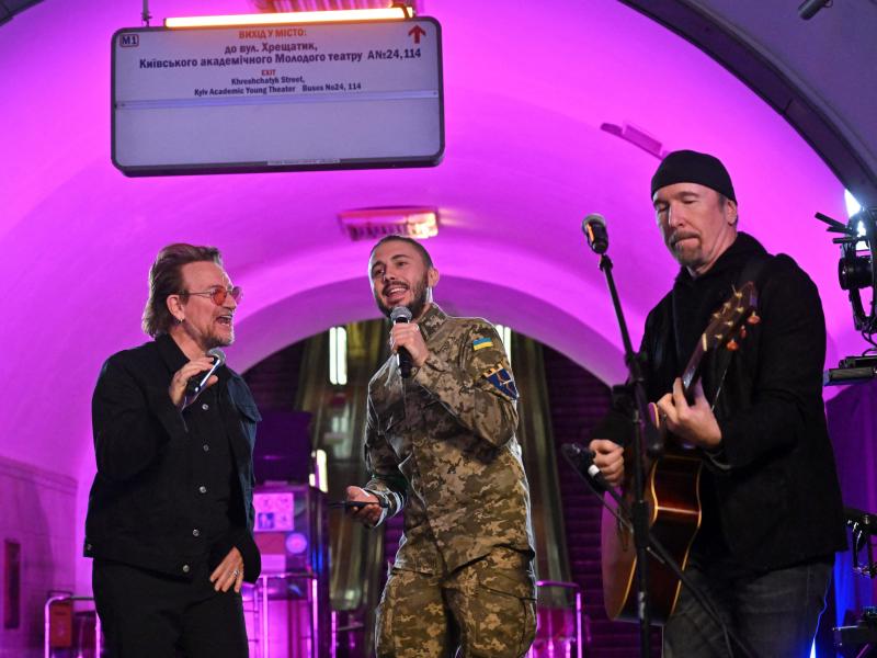 Bono, Taras Topolia and "The Edge" perform at a subway station-turned-bomb shelter in the Ukrainian capital of Kyiv on Sunday. Bono, Taras Topolia and "The Edge" perform at a subway station-turned-bomb shelter in the Ukrainian capital of Kyiv on Sunday.
