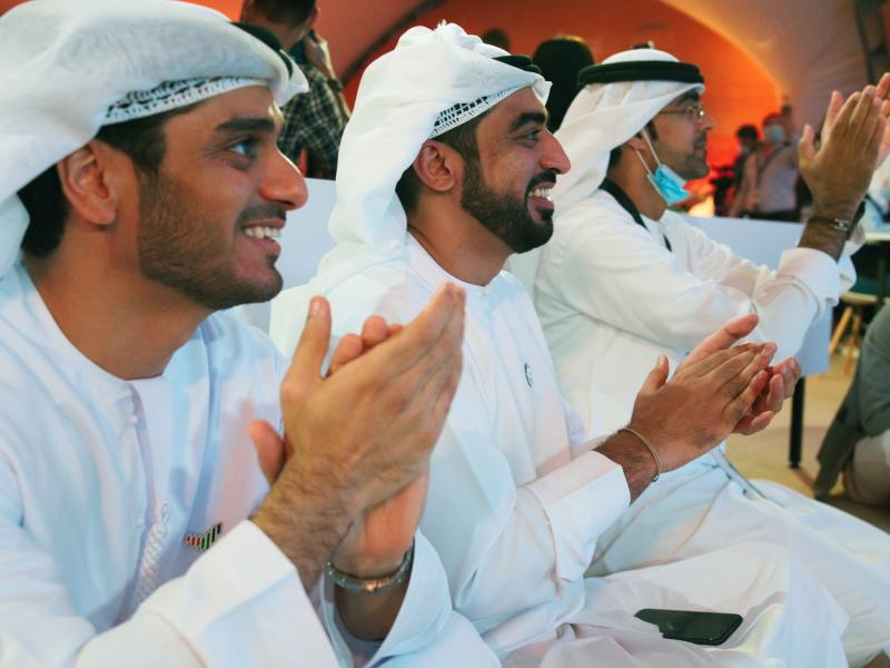 Emirati men clap as they watch the launch of the "Amal" or "Hope" space probe at the Mohammed bin Rashid Space Center in Dubai, United Arab Emirates, on Monday. The probe, the country's first interplanetary spacecraft, was launched from Japan. Emirati men clap as they watch the launch of the "Amal" or "Hope" space probe at the Mohammed bin Rashid Space Center in Dubai, United Arab Emirates, on Monday. The probe, the country's first interplanetary spacecraft, was launched from Japan.