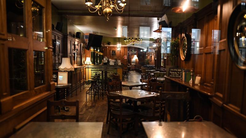An empty pub in London. On Friday, British Prime Minister Boris Johnson announced that the country's bars, pubs, restaurants and cafes must close to curb the spread of COVID-19, which has killed more than 100 people in the U.K. An empty pub in London. On Friday, British Prime Minister Boris Johnson announced that the country's bars, pubs, restaurants and cafes must close to curb the spread of COVID-19, which has killed more than 100 people in the U.K.