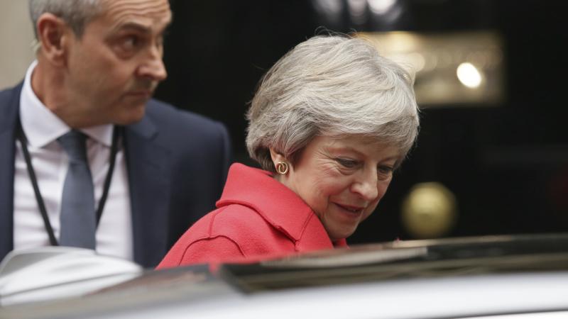 British Prime Minister Theresa May leaves No. 10 Downing St. for the Houses of Parliament on Thursday. Her speech there defending the tentative Brexit deal did little to calm critics — either among her political rivals or within her own party. British Prime Minister Theresa May leaves No. 10 Downing St. for the Houses of Parliament on Thursday. Her speech there defending the tentative Brexit deal did little to calm critics — either among her political rivals or within her own party.