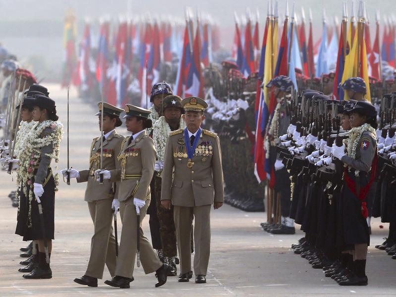Myanmar military deputy Commander in Chief, Vice Senior Gen. Soe Win, center, inspects military officers on Armed Forces Day last year. A U.N. human rights monitor is accusing the military of war crimes and crimes against humanity. Myanmar military deputy Commander in Chief, Vice Senior Gen. Soe Win, center, inspects military officers on Armed Forces Day last year. A U.N. human rights monitor is accusing the military of war crimes and crimes against humanity.