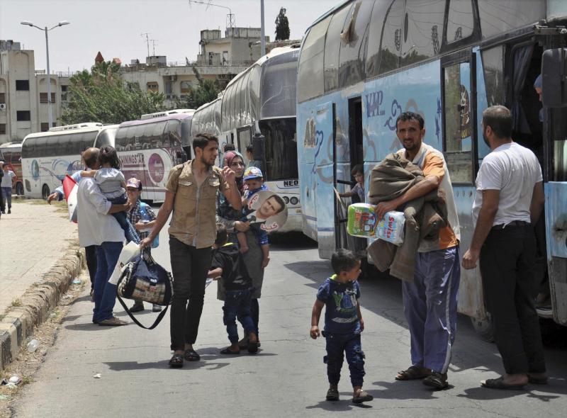 Syrians arriving last month from Jarablus, in Aleppo province, to their old neighborhood of al-Waer, in Homs, Syria. They left their homes to escape the government of Syrian President Bashar Assad, and now they are going back. Syrians arriving last month from Jarablus, in Aleppo province, to their old neighborhood of al-Waer, in Homs, Syria. They left their homes to escape the government of Syrian President Bashar Assad, and now they are going back.