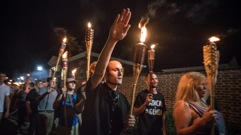 Chants of "White lives matter!" "You will not replace us!" and "Jews will not replace us!" rang out on Aug. 11 as several hundred white nationalists and supremacists carried torches through the University of Virginia. Chants of "White lives matter!" "You will not replace us!" and "Jews will not replace us!" rang out on Aug. 11 as several hundred white nationalists and supremacists carried torches through the University of Virginia.