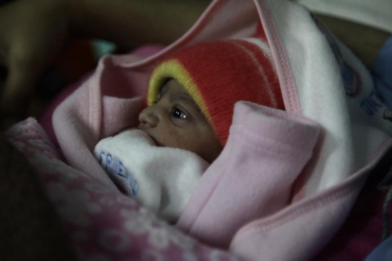 A 5-pound newborn girl is swaddled in a blanket in a hospital in Islamabad, Pakistan. She was born on Jan. 1, 2020. A 5-pound newborn girl is swaddled in a blanket in a hospital in Islamabad, Pakistan. She was born on Jan. 1, 2020.