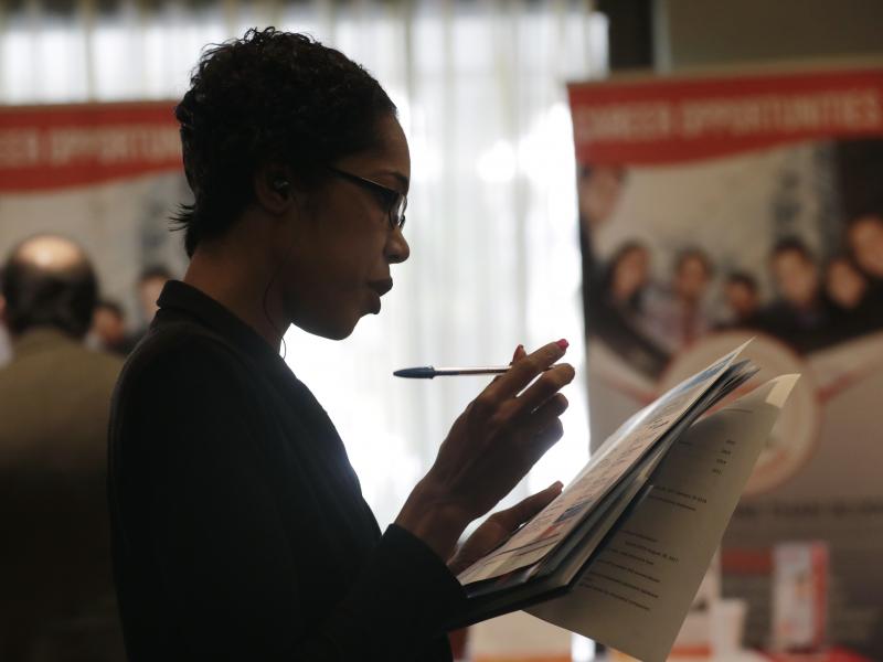 Joana Dudley looks at a list of job prospects at a job fair in Miami Lakes, Fla., in January. In the government's June jobs report, the unemployment rate ticked up to 4 percent with more people entering the labor force. Joana Dudley looks at a list of job prospects at a job fair in Miami Lakes, Fla., in January. In the government's June jobs report, the unemployment rate ticked up to 4 percent with more people entering the labor force.