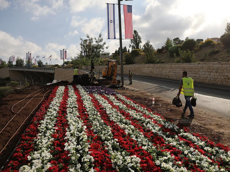 An American flag is designed in flowers near the entrance to the new American Embassy in Jerusalem, which is scheduled to open on Monday. It is a controversial move. An American flag is designed in flowers near the entrance to the new American Embassy in Jerusalem, which is scheduled to open on Monday. It is a controversial move.
