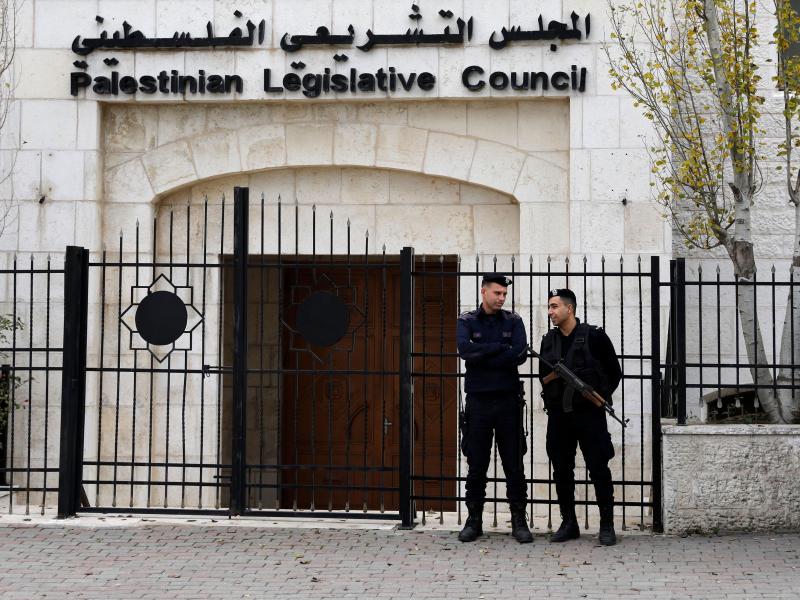 Palestinian security forces gather in front of the Palestinian Legislative Council building in Ramallah in the Israeli-occupied West Bank in December. Palestinian security forces gather in front of the Palestinian Legislative Council building in Ramallah in the Israeli-occupied West Bank in December.