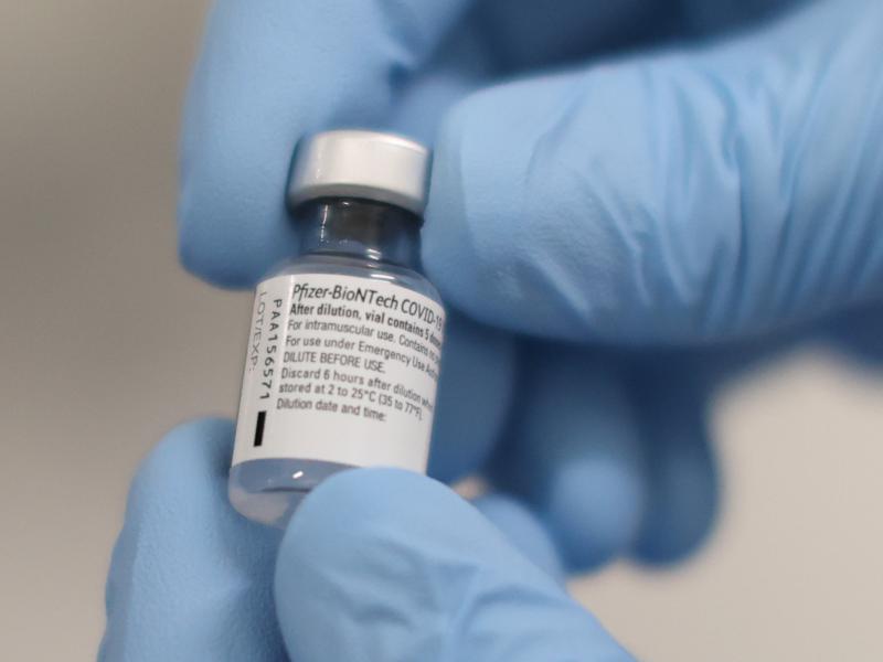 A vial of the COVID-19 vaccine developed by Pfizer and BioNTech that was used at the Royal Victoria Hospital in Belfast, U.K., on Tuesday. A vial of the COVID-19 vaccine developed by Pfizer and BioNTech that was used at the Royal Victoria Hospital in Belfast, U.K., on Tuesday.