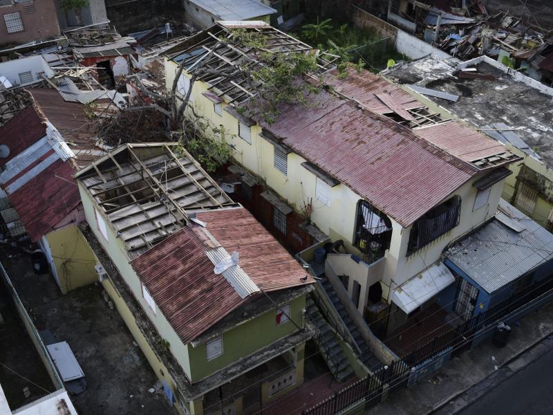 This photo taken last month in San Juan, Puerto Rico, shows roofs damaged by Hurricane Maria and the interior of buildings still exposed to the elements. This photo taken last month in San Juan, Puerto Rico, shows roofs damaged by Hurricane Maria and the interior of buildings still exposed to the elements.