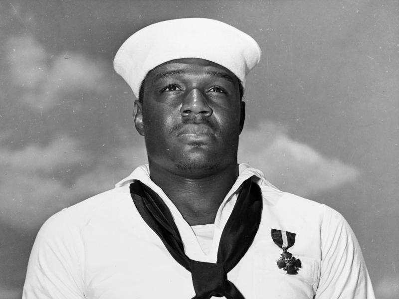 In this photo taken May 27, 1942, Mess Attendant 2nd Class Doris Miller stands at attention after being awarded the Navy Cross for for his actions aboard the USS West Virginia during the Japanese attack on Pearl Harbor on Dec. 7, 1941. In this photo taken May 27, 1942, Mess Attendant 2nd Class Doris Miller stands at attention after being awarded the Navy Cross for for his actions aboard the USS West Virginia during the Japanese attack on Pearl Harbor on Dec. 7, 1941.
