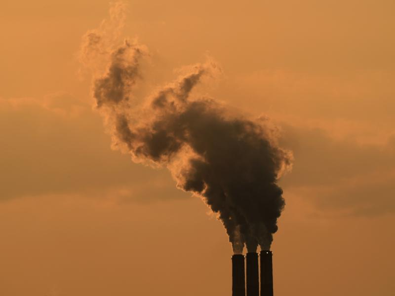 Smokestacks at the Jeffrey Energy Center coal-fired power plant are silhouetted against the sky at sunset in September near Emmet, Kan. Smokestacks at the Jeffrey Energy Center coal-fired power plant are silhouetted against the sky at sunset in September near Emmet, Kan.