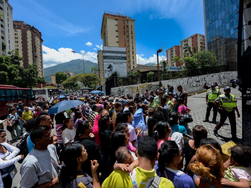 People line up to buy groceries outside a supermarket in Caracas, Venezuela's capital, on July 13. The State Department issued a travel warning for the country on July 7. Four other countries have been the subject of U.S. travel warnings since July 1. People line up to buy groceries outside a supermarket in Caracas, Venezuela's capital, on July 13. The State Department issued a travel warning for the country on July 7. Four other countries have been the subject of U.S. travel warnings since July 1.