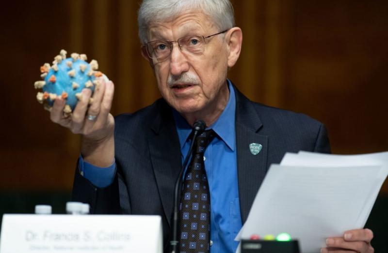 Director of the National Institutes of Health, Dr. Francis Collins, holds a model of the coronavirus. This is the sixth vaccine candidate to join Operation Warp Speed's portfolio, and the largest vaccine deal to date. Director of the National Institutes of Health, Dr. Francis Collins, holds a model of the coronavirus. This is the sixth vaccine candidate to join Operation Warp Speed's portfolio, and the largest vaccine deal to date.
