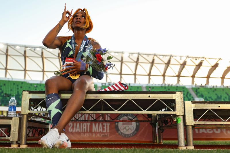 Sha'Carri Richardson points to the sky after winning the Women's 100 Meter final on day 2 of the 2020 U.S. Olympic Track & Field Team Trials at Hayward Field on June 19, 2021 in Eugene, Oregon. Sha'Carri Richardson points to the sky after winning the Women's 100 Meter final on day 2 of the 2020 U.S. Olympic Track & Field Team Trials at Hayward Field on June 19, 2021 in Eugene, Oregon.