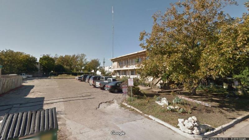 An antenna tower is seen at the Orchard Plaza apartment building in Austin in 2014, the year the FCC imposed a penalty on the building's owners for operating a pirate radio station. An antenna tower is seen at the Orchard Plaza apartment building in Austin in 2014, the year the FCC imposed a penalty on the building's owners for operating a pirate radio station.