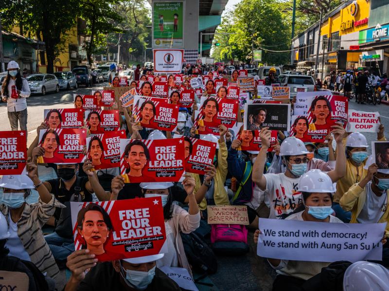 Protesters hold images of de-facto leader Aung San Suu Kyi on Wednesday in Yangon, Myanmar. As fallout from the Feb. 1 military coup continues, U.S. President Joe Biden announced plans to sanction the leaders who directed it. Protesters hold images of de-facto leader Aung San Suu Kyi on Wednesday in Yangon, Myanmar. As fallout from the Feb. 1 military coup continues, U.S. President Joe Biden announced plans to sanction the leaders who directed it.