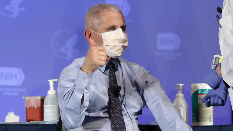 U.S. infectious disease expert Dr. Anthony Fauci informed the WHO on Thursday that the U.S. will not be leaving the organization. Fauci is seen here last month, receiving the Moderna coronavirus vaccine in Washington. U.S. infectious disease expert Dr. Anthony Fauci informed the WHO on Thursday that the U.S. will not be leaving the organization. Fauci is seen here last month, receiving the Moderna coronavirus vaccine in Washington.