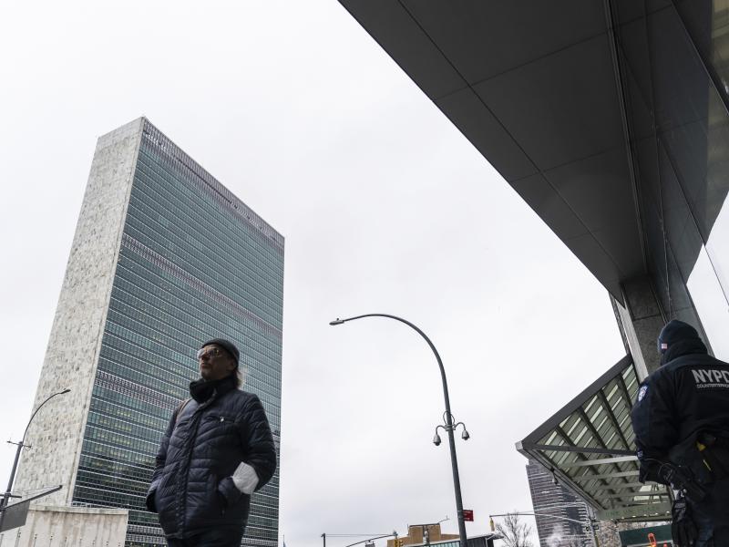 A pedestrian walks past outside U.N. headquarters, Friday, Feb. 25, 2022, in New York. A pedestrian walks past outside U.N. headquarters, Friday, Feb. 25, 2022, in New York.