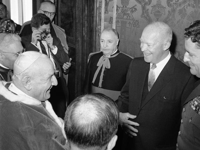Pope John XXIII with President Dwight D. Eisenhower, who stands at left, during an audience granted in the pontiff's private library in the Vatican Palace on Dec. 6, 1959. Eisenhower was the second U.S. president to meet the pope. Pope John XXIII with President Dwight D. Eisenhower, who stands at left, during an audience granted in the pontiff's private library in the Vatican Palace on Dec. 6, 1959. Eisenhower was the second U.S. president to meet the pope.