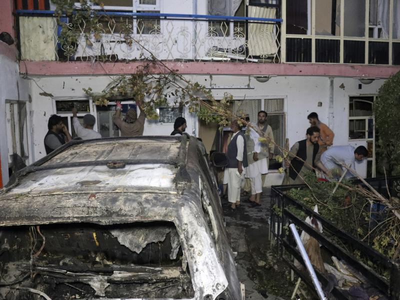 Afghans inspect damage of the Ahmadi family house after a U.S. drone strike in Kabul, Afghanistan, on Aug. 29. The strike, which the Pentagon originally deemed a success in striking an ISIS-K target, killed 10 civilians, none of whom were associated with Afghans inspect damage of the Ahmadi family house after a U.S. drone strike in Kabul, Afghanistan, on Aug. 29. The strike, which the Pentagon originally deemed a success in striking an ISIS-K target, killed 10 civilians, none of whom were associated with
