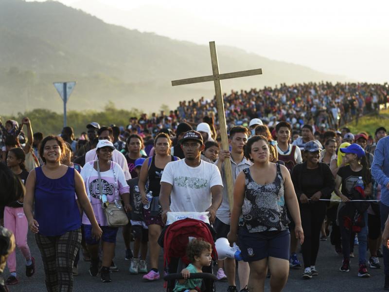 Migrants leave Huixtla, Chiapas state, Mexico, on Oct. 27 as they continue their trek north toward Mexico's northern states and the U.S. border. Migrants leave Huixtla, Chiapas state, Mexico, on Oct. 27 as they continue their trek north toward Mexico's northern states and the U.S. border.