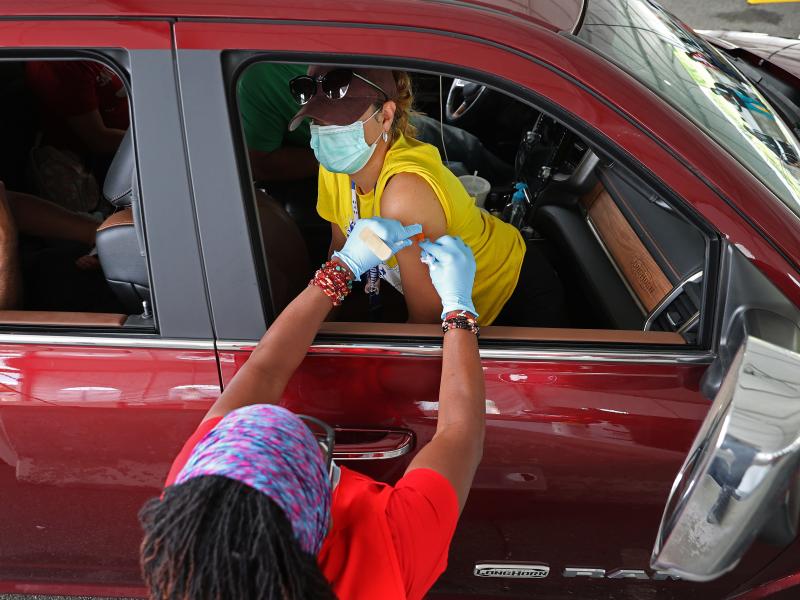 People who need help getting to a vaccination site will be able to get free or discounted rides through Uber and Lyft, the White House says. Here, a woman receives her first dose of the Pfizer vaccine at a mass vaccination site in Aberdeen, Md., after get People who need help getting to a vaccination site will be able to get free or discounted rides through Uber and Lyft, the White House says. Here, a woman receives her first dose of the Pfizer vaccine at a mass vaccination site in Aberdeen, Md., after get