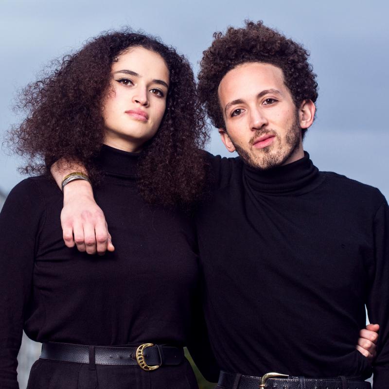 Nesma (left) and Anys are Algerian siblings who came out to each other at a party. They live in Paris, and both identify as queer. "It now makes us stronger and committed together for the queer and Algerian causes," Anys says. Nesma (left) and Anys are Algerian siblings who came out to each other at a party. They live in Paris, and both identify as queer. "It now makes us stronger and committed together for the queer and Algerian causes," Anys says.