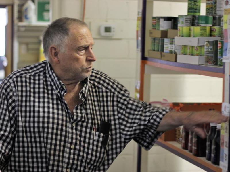 Leroy Bates shops at the Rising Up food pantry in Fort Morgan, Colo. Clients can visit it 13 times a year. Leroy Bates shops at the Rising Up food pantry in Fort Morgan, Colo. Clients can visit it 13 times a year.