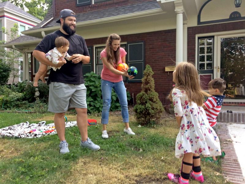 Entrepreneur Stinson Dean (left) and his wife Stephanie play with their three children in their yard in Independence, Mo. He says the Affordable Care Act made it possible for him to start his own business. Entrepreneur Stinson Dean (left) and his wife Stephanie play with their three children in their yard in Independence, Mo. He says the Affordable Care Act made it possible for him to start his own business.