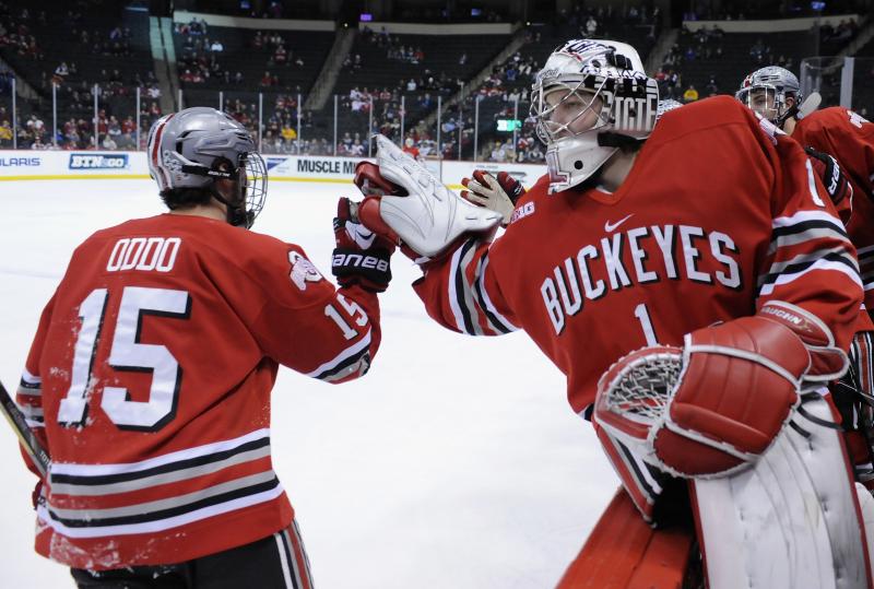 Logan Davis #1 congratulates Ohio State Buckeyes teammate Nick Oddo #15 for scoring a goal on March 22, 2014. Logan Davis #1 congratulates Ohio State Buckeyes teammate Nick Oddo #15 for scoring a goal on March 22, 2014.