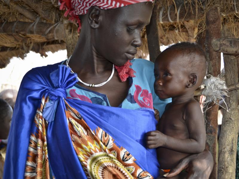 Elizabeth Nyakoda holds her 10-month-old daughter at a feeding center for children in South Sudan. Elizabeth Nyakoda holds her 10-month-old daughter at a feeding center for children in South Sudan.