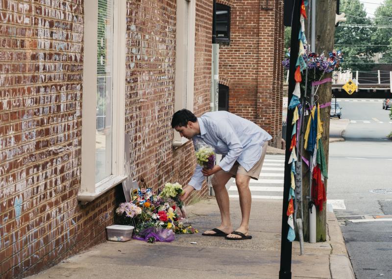 Peter Reijmers, 29, of Charlottesville, lays flowers at a memorial on 4th Street SE where Heather Heyer was killed last August. Peter Reijmers, 29, of Charlottesville, lays flowers at a memorial on 4th Street SE where Heather Heyer was killed last August.