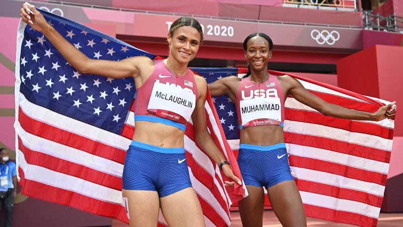 Team USA topped the medals list at the Tokyo Games, narrowly edging China in golds. Here, track stars Sydney McLaughlin (left) and Dalilah Muhammad celebrate winning gold and silver respectively in the women's 400-meter hurdles in Tokyo. Team USA topped the medals list at the Tokyo Games, narrowly edging China in golds. Here, track stars Sydney McLaughlin (left) and Dalilah Muhammad celebrate winning gold and silver respectively in the women's 400-meter hurdles in Tokyo.