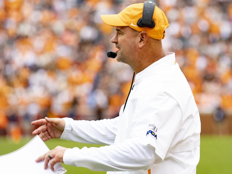 University of Tennessee head football coach Jeremy Pruitt directs players at a game on Oct. 12, 2019. University officials announced they will fire Pruitt and nine football team staff members after an investigation found a slew of likely NCAA violations. University of Tennessee head football coach Jeremy Pruitt directs players at a game on Oct. 12, 2019. University officials announced they will fire Pruitt and nine football team staff members after an investigation found a slew of likely NCAA violations.