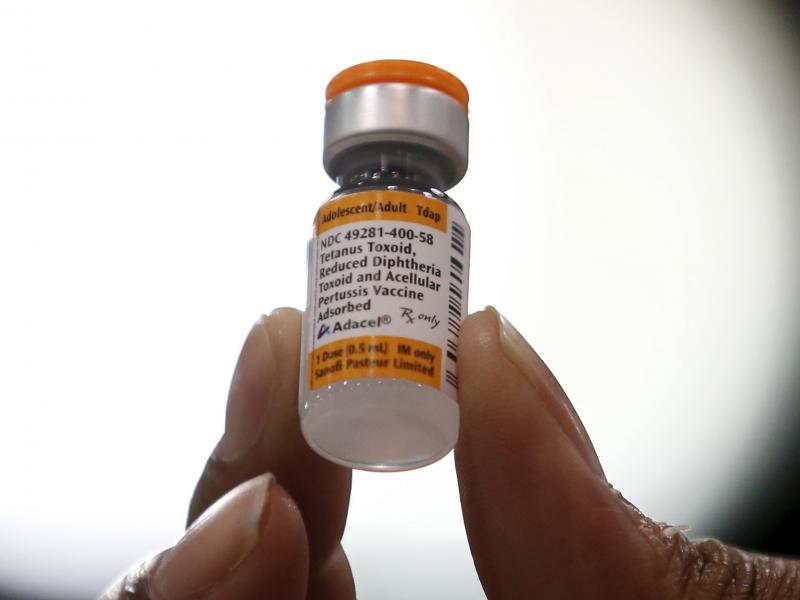 A nurse holds a tetanus, diphtheria and whooping cough vaccine in 2016. Physician Judith Guzman-Cottrill tells NPR that she has met many families who hesitate to give their children vaccines. A nurse holds a tetanus, diphtheria and whooping cough vaccine in 2016. Physician Judith Guzman-Cottrill tells NPR that she has met many families who hesitate to give their children vaccines.