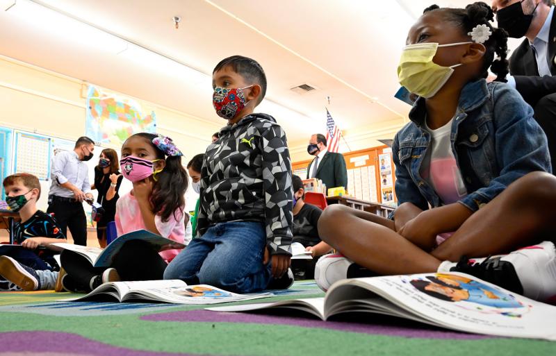 First-graders listen to the interim superintendent of the Los Angeles Unified School District, Megan Reilly, read a book at Normont Elementary School in Harbor City on Aug. 16, the first day of school. First-graders listen to the interim superintendent of the Los Angeles Unified School District, Megan Reilly, read a book at Normont Elementary School in Harbor City on Aug. 16, the first day of school.