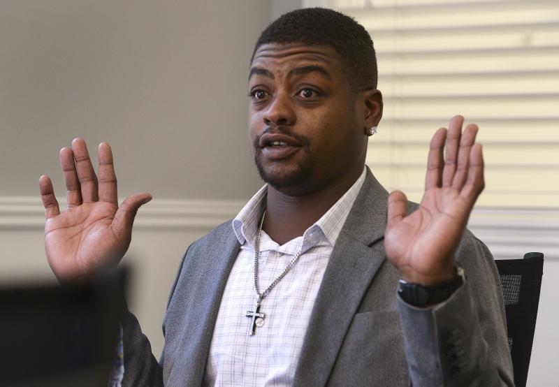 Jeffery Ryans, who sustained multiple dog bites, is shown here discussing his encounter with Salt Lake City police at his attorney's office in Salt Lake City. Jeffery Ryans, who sustained multiple dog bites, is shown here discussing his encounter with Salt Lake City police at his attorney's office in Salt Lake City.