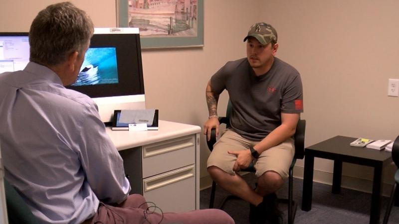 Former Marine Josh Onan talks with George Kevin Flood, a staff psychiatrist at the San Diego VA. Onan is taking advantage of a year-old program that makes VA care available to people with less-than-honorable military discharges. Former Marine Josh Onan talks with George Kevin Flood, a staff psychiatrist at the San Diego VA. Onan is taking advantage of a year-old program that makes VA care available to people with less-than-honorable military discharges.