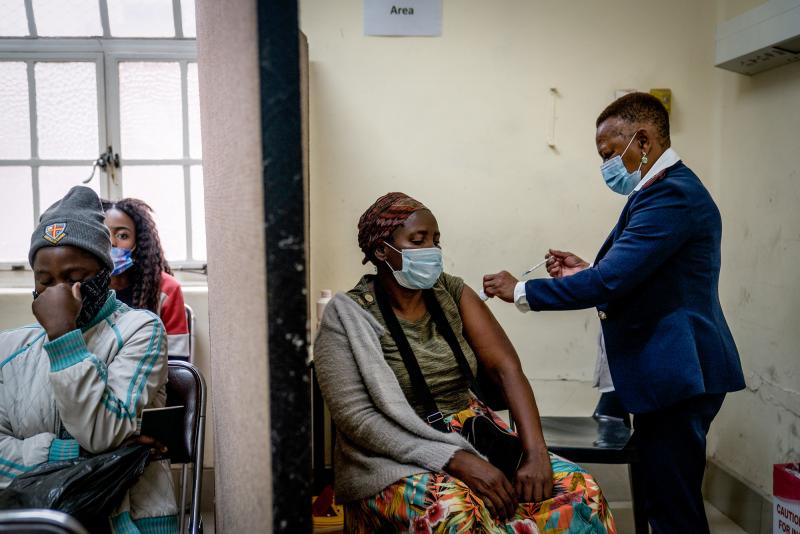 A woman is vaccinated against COVID-19 at a clinic in Johannesburg on Dec. 6. A new study from South Africa looks at the effectiveness of the Pfizer vaccine in preventing infection and severe disease. A woman is vaccinated against COVID-19 at a clinic in Johannesburg on Dec. 6. A new study from South Africa looks at the effectiveness of the Pfizer vaccine in preventing infection and severe disease.